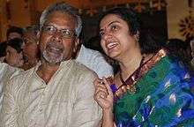 Mani Ratnam seated to the right of Suhasini.