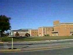 A video showing the town square, the Courthouse-on-the-Square, and University of North Texas campus including water fountains, library and student services center.