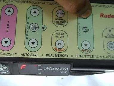 Electronic tanpura in action. Change of some settings of this machine shown. The machine is an electronic simulation of traditional Tanpura, it is designed to produce some tones repeatingly.