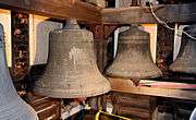 This is an image of the 7th and 3rd Bells in the Highland Arts Theatre Chime, showing the inscription "MC SHANE BELL FOUNDRY CO., BALTIMORE, MD., 1911" on their waist.