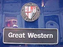 A black nameplate stating "Great Western" with a multi-coloured shield above.