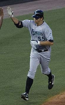 Josh Johnson giving a high-five while walking