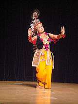 A Manipuri Dancer in traditional Krishna attire.jpg