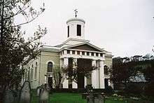 The classical facade of St Swithun's Church, Allington.