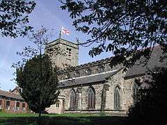 A church of stone construction in the Norman style.