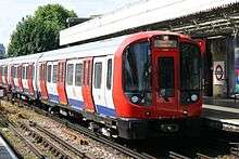 A photograph of an S Stock train at Putney Bridge