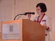 Barbara Simons at a lectern