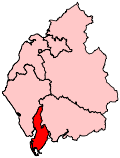 A small constituency in the south of the county. It includes a long but very thin island to the west of the mainland part of the constituency.