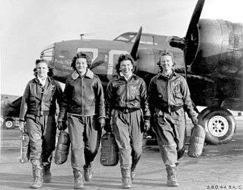 These four female pilots leaving their ship at the four engine school at Lockbourne are members of a group of WASPS who have been trained to ferry the B-17 Flying Fortresses. Circa 1944