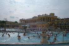 Pool in front of a large building