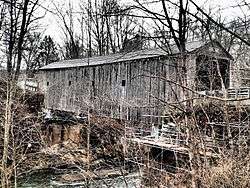 color photo of covered bridge