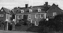 Old photo of main building, c. 1935–1940