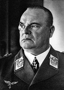 Head-and-shoulders portrait of a uniformed Nazi German air force general in his 50s wearing an Iron Cross