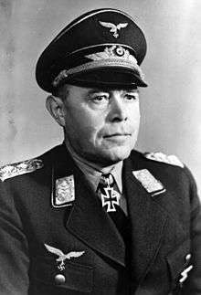 Head-and-shoulders portrait of a uniformed Nazi German air force general in his 50s wearing an Iron Cross.