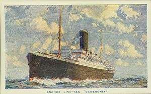 An impressive ocean liner on the high seas, billowing steam as it goes