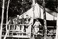 Camp Highlands Tent Crew with Golden Retreiver, Flag and Bunks circa 1915.jpg