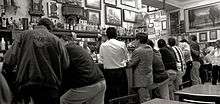 Locals at the bar of the El Nivel cantina