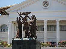 Statue of people and doves