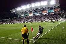 A player taking a corner kick