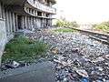 Current situation of the Grande Hotel, waste hump on front façade terrace.JPG