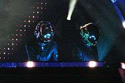 Daft Punk at O2 Wireless Festival, helmeted musicians at keyboard