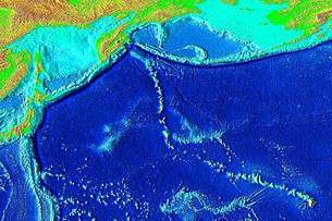 Elevation of the Pacific seafloor, showing the Hawaiian-Emperor seamount chain, including Koko Guyot above the prominent bend. The sharp "V" separates the Hawaiian Ridge from the older Emperor Seamount portion of the chain. Koko is the largest of the seamounts directly north of the v-bend.