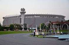 Photograph of the outside of a modern football stadium