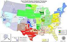 A map of the United States divided into numerous (83) districts, differentiated by colors, which are grouped by shades indicating the Farm Credit Bank or Agricultural Credit Bank district to which it belongs.