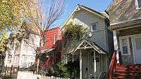 In 2004, NHSRC's two-story Factor 10 house (red house pictured) at 1919 N. Keeler in the Hermosa neighborhood was named one of the top 10 Green Projects by the American Institute of Architects.