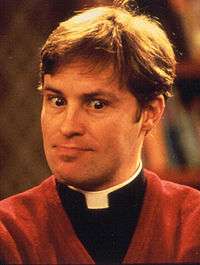 A publicity photograph of Irish actor Ardal O'Hanlon as Father Dougal McGuire