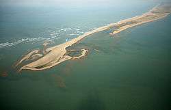 Dhanushkodi island among blue waters of Bay of Bengal.