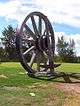 View of large wheel and pick axe at Fort Assiniboine