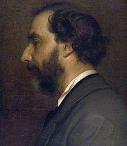 portrait of a dark bearded middle-aged man