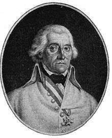 Black and white oval print of a man with round eyes who wears a white military uniform.