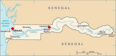 A map of The Gambia indicating the locations in the west and center where travellers may cross in order to arrive at Carabane