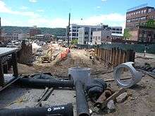 A large construction site in an urban area