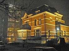 Office building illuminated by high-pressure sodium lamps.