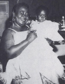 Picture of Hannah Kudjoe with un-named great-niece (a baby), taken by her nephew, Peter Dadson.