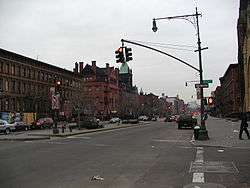 ATLAH Worldwide Church in the center of view from the northwest corner of 124th Street looking Southward....