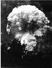 A mushroom cloud forming.