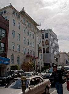 Facade of the now-demolished 1924 building. The 1979 annex stands uphill.