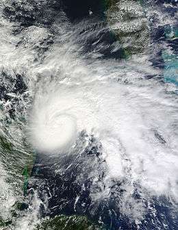 A sprawling hurricane over the Yucatan Channel, with clouds from the storm covering much of the Caribbean Sea