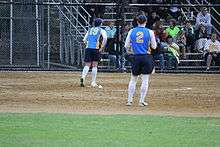 women playing softball