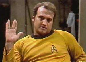 actor John Belushi performing the Vulcan salute in the sketch