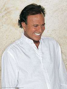 A man in a white dress shirt.