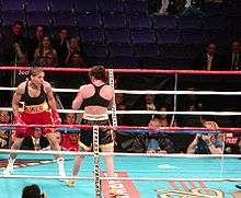 Lucia Rijker and unidentified rival boxing.