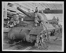 M10 shown in mass production at General Motors tank arsenal.