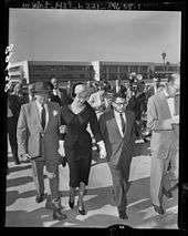 Marilyn Monroe walking from Santa Monica courthouse with her attorney, Jerry Giesler, and gossip columnist and friend, Sidney Skolsky, after divorce from Joe DiMaggio