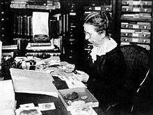 Mary Jane Rathbun working with crab specimens.