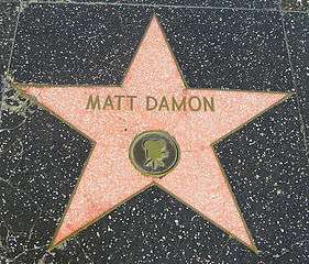 Pink granite star on a black granite side-walk